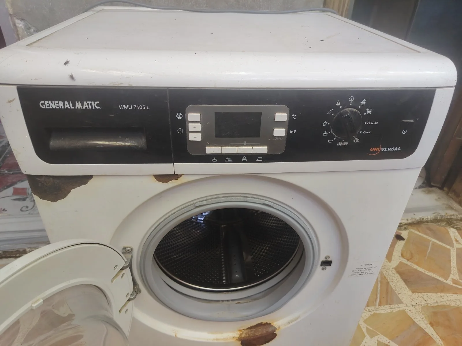 دير الزور المدينه غسالة تمتيك جنرال ماتيك يونيفرسال موديل WMU7105 بسعه غسيل 7كغ النظافه 90 بل ميه خاليه من اي شيء على الفحص المباشر — صورة 4